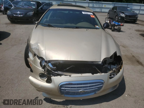 2001 Chrysler LHS z VIN 2C3HC56G41H544935, wystawiony jako Copart lot #59507714 z przebiegiem Nie podano mil oraz Szkody całkowita. Historia ofert i sprzedaży dostępna na DreamBid. Obrazek 5.
