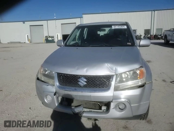 2006 Suzuki Grand Vitara z VIN JS3TE941364101882, wystawiony jako Copart lot #84143364 z przebiegiem 148 560 mil mil oraz Szkody całkowita. Historia ofert i sprzedaży dostępna na DreamBid. Obrazek 12.