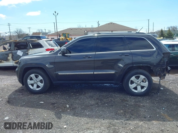 2011 Jeep Grand Cherokee Laredo with VIN 1J4RR4GG9BC723395, listed as a IAAI auction lot 42092022 with 86,226 mi miles and . Bid and sale history available at DreamBid. Image 14.