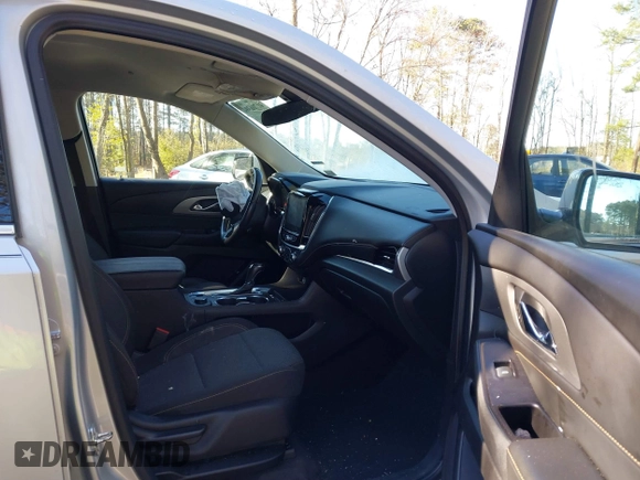 2020 Chevrolet Traverse LT Cloth with VIN 1GNERGKW4LJ215277, listed as a IAAI auction lot 41706394 with 84,762 mi miles. Bid and sale history available at carsss.com. Image 5.