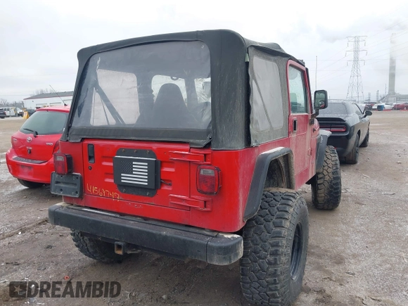 2002 Jeep Wrangler X z VIN 1J4FA39S52P708519, wystawiony jako IAAI lot #41569747 z przebiegiem 219 168 mil mil oraz . Historia ofert i sprzedaży dostępna na DreamBid. Obrazek 4.