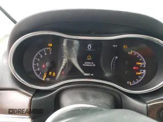 2014 Jeep Grand Cherokee Limited z VIN 1C4RJFBG7EC546642, wystawiony jako Copart lot #61445615 z przebiegiem 128 921 mil mil oraz Szkoda całkowita • Salvage title. Historia ofert i sprzedaży dostępna na DreamBid. Obrazek 9.