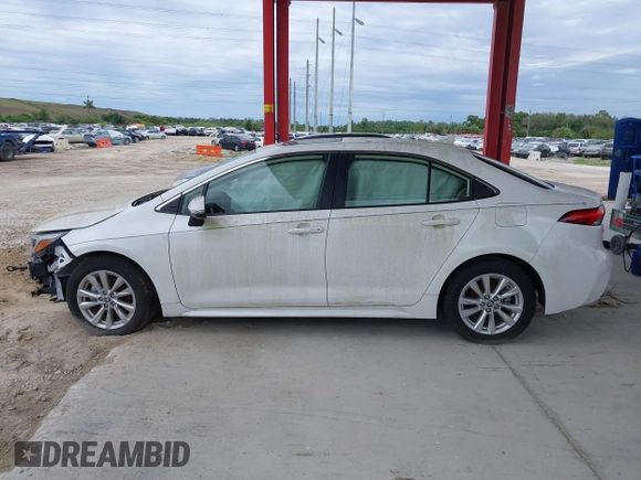 2023 Toyota Corolla Hybrid LE with VIN JTDBCMFE8P3012027, listed as a IAAI auction lot 41517460 with 4,424 mi miles. Bid and sale history available at carsss.com. Image 14.