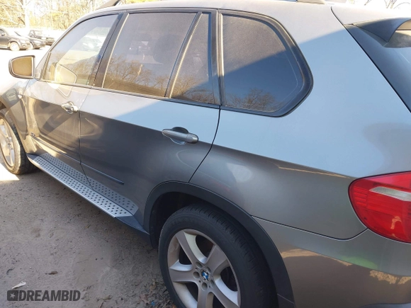 2007 BMW X5 3.0si with VIN 5UXFE43517LY81390, listed as a IAAI auction lot 41671651 with 157,652 mi miles. Bid and sale history available at carsss.com. Image 3.