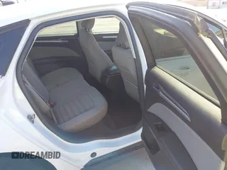 2016 Ford Fusion S z VIN 3FA6P0G79GR157809, wystawiony jako IAAI lot #41994860 z przebiegiem 161 049 mil mil oraz . Historia ofert i sprzedaży dostępna na DreamBid. Obrazek 8.
