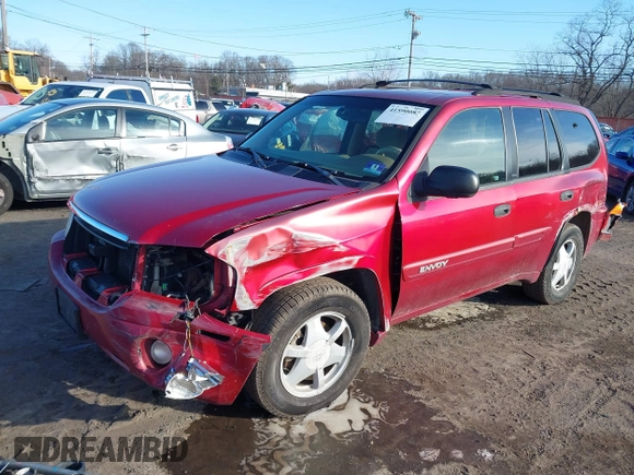2002 GMC Envoy SLT with VIN 1GKDT13S222517064, listed as a IAAI auction lot 41590087 with 312,164 mi miles. Bid and sale history available at carsss.com. Image 19.
