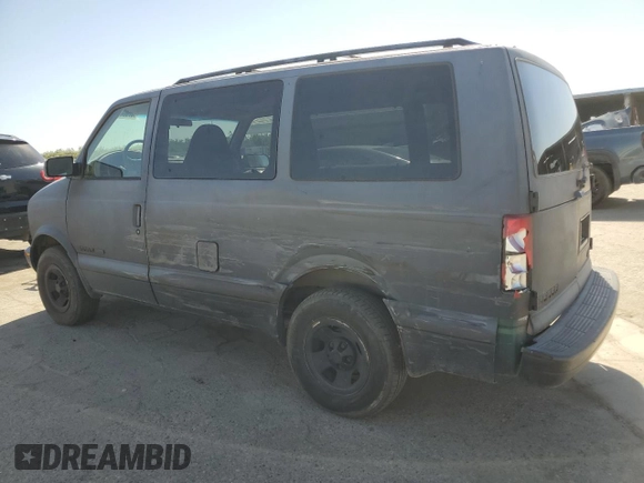 1998 GMC Safari z VIN 1GKEL19W6WB525088, wystawiony jako Copart lot #67982664 z przebiegiem 163 182 mil mil oraz Szkody całkowita. Historia ofert i sprzedaży dostępna na DreamBid. Obrazek 2.