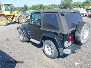 2003 Jeep Wrangler Sahara with VIN 1J4FA59S23P328003, listed as a IAAI auction lot 42833276 with 271,741 mi miles and . Bid and sale history available at DreamBid. Image 3.