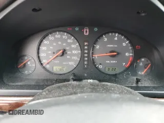 2000 Subaru Legacy with VIN 4S3BE6451Y7207874, listed as a Copart auction lot 59583325 with 57,861 mi miles and Salvage title. Bid and sale history available at DreamBid. Image 9.