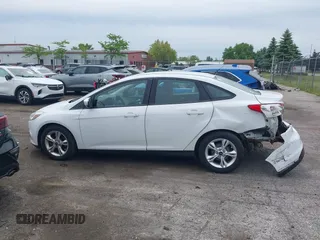 2013 Ford Focus SE with VIN 1FADP3F24DL380185, listed as a IAAI auction lot 42312998 with Not provided miles and . Bid and sale history available at DreamBid. Image 14.