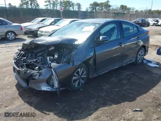 2018 Toyota Prius Prime Plus with VIN JTDKARFP3J3096141, listed as a IAAI auction lot 41822905 with 61,159 mi miles. Bid and sale history available at carsss.com. Image 2.
