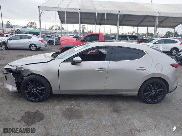 2023 Mazda Mazda3 Hatchback 2.5 S Premium with VIN JM1BPBMM9P1608889, listed as a IAAI auction lot 41206243 with 22,217 mi miles. Bid and sale history available at carsss.com. Image 14.