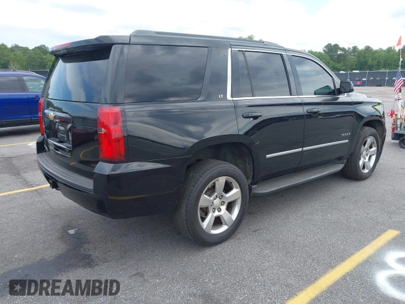 2015 Chevrolet Tahoe LT with VIN 1GNSCBKC4FR145119, listed as a IAAI auction lot 42309931 with 99,408 mi miles and . Bid and sale history available at DreamBid. Image 4.