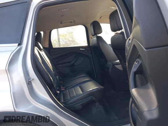 2013 Ford Escape SEL with VIN 1FMCU0HX4DUB98238, listed as a IAAI auction lot 41973221 with 131,590 mi miles and . Bid and sale history available at DreamBid. Image 8.