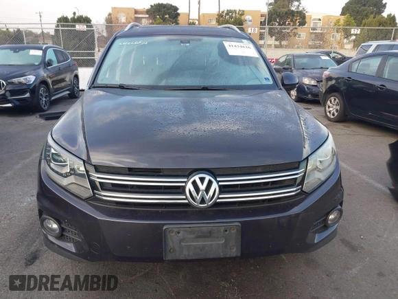 2016 Volkswagen Tiguan S with VIN WVGBV7AX5GW568438, listed as a IAAI auction lot 41434616 with 91,341 mi miles and . Bid and sale history available at DreamBid. Image 13.