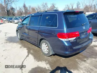 2010 Honda Odyssey EX-L with VIN 5FNRL3H76AB058912, listed as a IAAI auction lot 41558361 with 206,841 mi miles and . Bid and sale history available at DreamBid. Image 3.