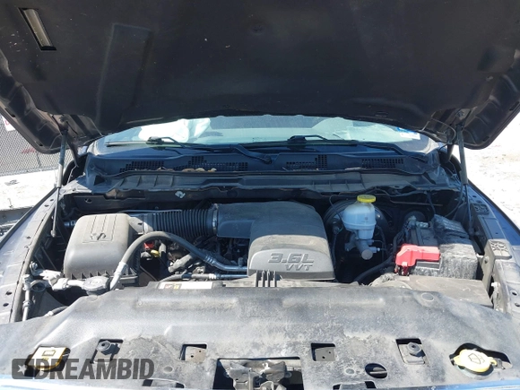 2020 Ram 1500 Tradesman with VIN 1C6RR6FG7LS153348, listed as a IAAI auction lot 41977543 with 69,604 mi miles and . Bid and sale history available at DreamBid. Image 10.