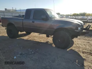 2004 Ford Ranger XL Fleet with VIN 1FTZR45E04PB59106, listed as a Copart auction lot 52477525 with 330,703 mi miles and Salvage title. Bid and sale history available at DreamBid. Image 4.