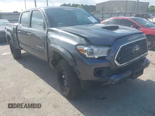 2018 Toyota Tacoma SR5 with VIN 3TMDZ5BN0JM051283, listed as a IAAI auction lot 42438690 with 106,155 mi miles and . Bid and sale history available at DreamBid. Image 1.