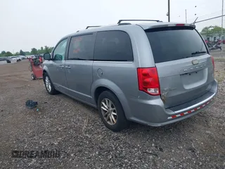 2018 Dodge Grand Caravan SXT z VIN 2C4RDGCG7JR301434, wystawiony jako IAAI lot #42510771 z przebiegiem 270 524 mil mil oraz . Historia ofert i sprzedaży dostępna na DreamBid. Obrazek 3.