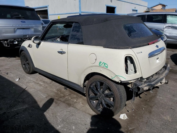 2014 MINI Cooper Convertible with VIN WMWZN3C59ET569823, listed as a Copart auction lot 72543194 with 56,730 mi miles and Salvage Title. Bid and sale history available at carsss.com. Image 2.