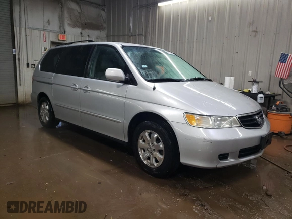 2004 Honda Odyssey EX-L with VIN 5FNRL189X4B098131, listed as a Copart auction lot 47294865 with 196,581 mi miles and Salvage Title. Bid and sale history available at DreamBid. Image 4.