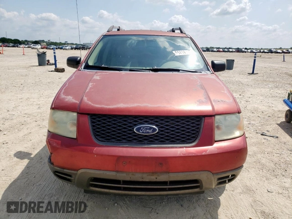 2005 Ford Freestyle SE with VIN 1FMZK01105GA54885, listed as a Copart auction lot 58414145 with 306,275 mi miles and Salvage title. Bid and sale history available at DreamBid. Image 5.