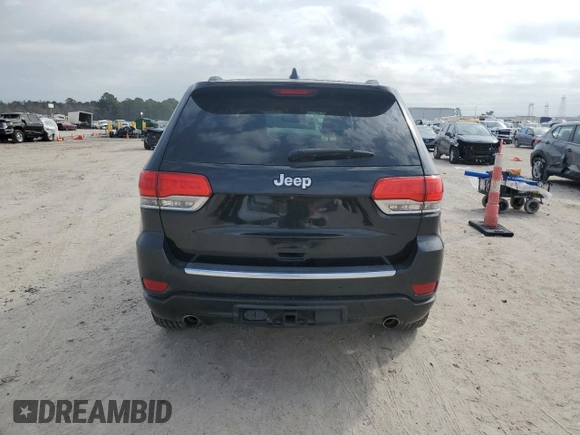 2015 Jeep Grand Cherokee Overland with VIN 1C4RJFCT6FC628729, listed as a Copart auction lot 44979155 with 105,959 mi miles and Salvage Title. Bid and sale history available at DreamBid. Image 6.