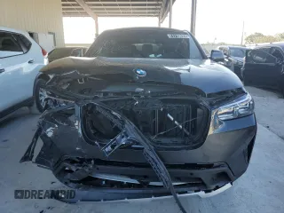 2022 BMW X4 xDrive30i z VIN 5UX33DT09N9L93053, wystawiony jako Copart lot #71710692 z przebiegiem Nie podano mil oraz . Historia ofert i sprzedaży dostępna na DreamBid. Obrazek 5.
