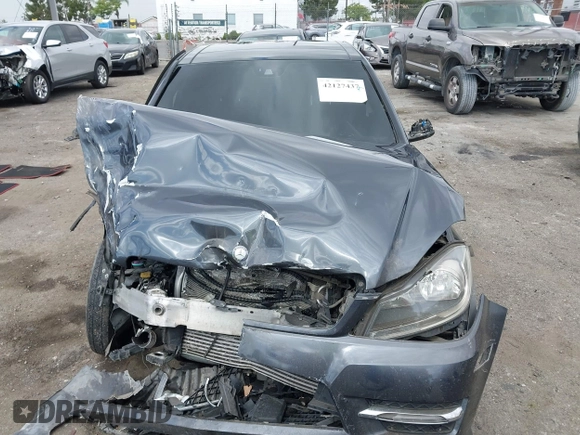 2014 Mercedes-Benz C C 250 Sport with VIN WDDGF4HB6ER317333, listed as a IAAI auction lot 42127437 with 128,010 mi miles. Bid and sale history available at carsss.com. Image 13.