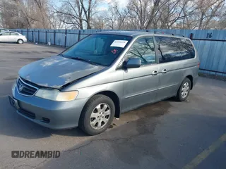 2002 Honda Odyssey EX z VIN 5FNRL186X2B014652, wystawiony jako IAAI lot #41950225 z przebiegiem 286 959 mil mil oraz . Historia ofert i sprzedaży dostępna na DreamBid. Obrazek 2.