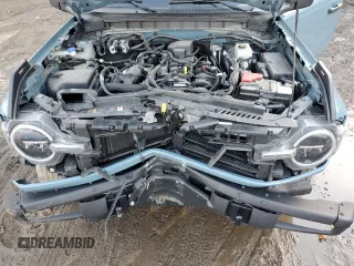2022 Ford Bronco z VIN 1FMDE5AH6NLB71051, wystawiony jako Copart lot #77580794 z przebiegiem 20 904 mil mil oraz Szkoda całkowita • Salvage title. Historia ofert i sprzedaży dostępna na DreamBid. Obrazek 13.