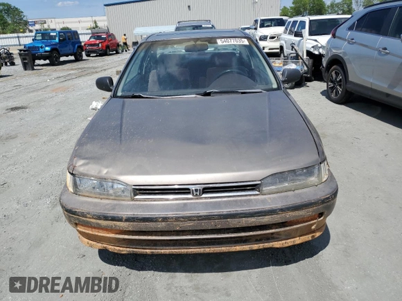1992 Honda Accord z VIN 1HGCB7277NA019206, wystawiony jako Copart lot #54077035 z przebiegiem 227 766 mil mil oraz Szkoda całkowita • Salvage title. Historia ofert i sprzedaży dostępna na DreamBid. Obrazek 5.