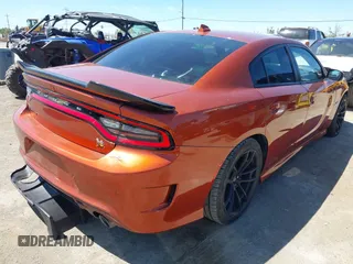 2020 Dodge Charger Scat Pack z VIN 2C3CDXGJ7LH223858, wystawiony jako IAAI lot #42221044 z przebiegiem 42 561 mil mil oraz . Historia ofert i sprzedaży dostępna na DreamBid. Obrazek 4.