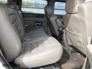 2004 Hummer H2 with VIN 5GRGN23U64H122670, listed as a IAAI auction lot 41908517 with 189,736 mi miles. Bid and sale history available at carsss.com. Image 8.