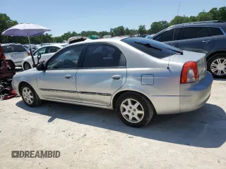 2004 Kia Spectra GS with VIN KNAFB161945141309, listed as a Copart auction lot 52395445 with 99,100 mi miles and Clean Title. Bid and sale history available at DreamBid. Image 2.