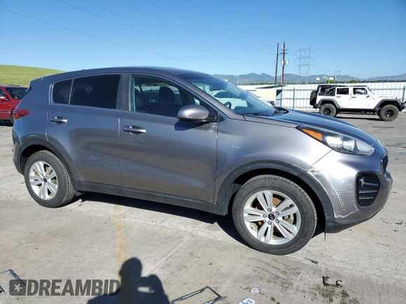 2018 Kia Sportage LX z VIN KNDPMCAC8J7330264, wystawiony jako Copart lot #61582275 z przebiegiem 93 201 mil mil oraz Czysty tytuł • Clean title. Historia ofert i sprzedaży dostępna na DreamBid. Obrazek 4.