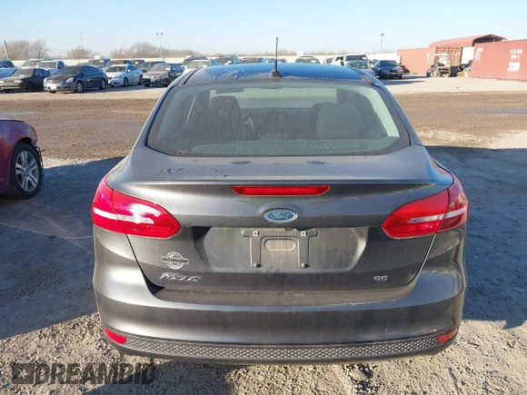 2018 Ford Focus SE with VIN 1FADP3F20JL216525, listed as a IAAI auction lot 41744383 with 92,385 mi miles. Bid and sale history available at carsss.com. Image 16.