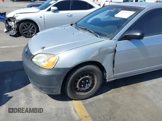 2003 Honda Civic LX with VIN 1HGEM22563L085882, listed as a IAAI auction lot 42227001 with 202,724 mi miles and . Bid and sale history available at DreamBid. Image 6.