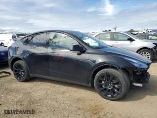 2022 Tesla Model Y Long Range with VIN 7SAYGDEE2NF575433, listed as a Copart auction lot 47576175 with 53,642 mi miles and Salvage Title. Bid and sale history available at carsss.com. Image 4.