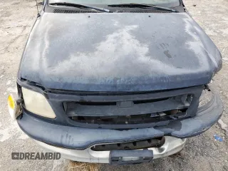 1998 Ford F-150 with VIN 1FTZF18W6WNA50479, listed as a Copart auction lot 42035055 with 125,861 mi miles and Salvage title. Bid and sale history available at DreamBid. Image 11.