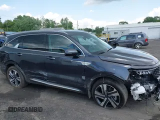 2023 Kia Sorento EX with VIN KNDRHDLG9P5159354, listed as a IAAI auction lot 42559220 with 34,733 mi miles and . Bid and sale history available at DreamBid. Image 6.