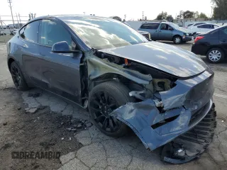 2023 Tesla Model Y Long Range z VIN 7SAYGAEE7PF714828, wystawiony jako Copart lot #89210485 z przebiegiem 42 256 mil mil oraz Szkoda całkowita • Salvage title. Historia ofert i sprzedaży dostępna na DreamBid. Obrazek 4.