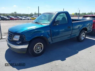 2000 Ford F-150 XL with VIN 3FTZF1722YMA80722, listed as a IAAI auction lot 40449042 with 205,576 mi miles and . Bid and sale history available at DreamBid. Image 2.