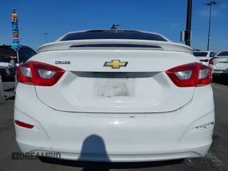 2017 Chevrolet Cruze LS z VIN 1G1BC5SMXH7181536, wystawiony jako IAAI lot #42317266 z przebiegiem 124 380 mil mil oraz . Historia ofert i sprzedaży dostępna na DreamBid. Obrazek 16.