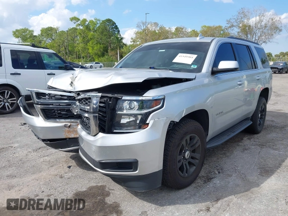 2018 Chevrolet Tahoe LT with VIN 1GNSCBKCXJR367852, listed as a IAAI auction lot 41549304 with 151,684 mi miles and . Bid and sale history available at DreamBid. Image 12.