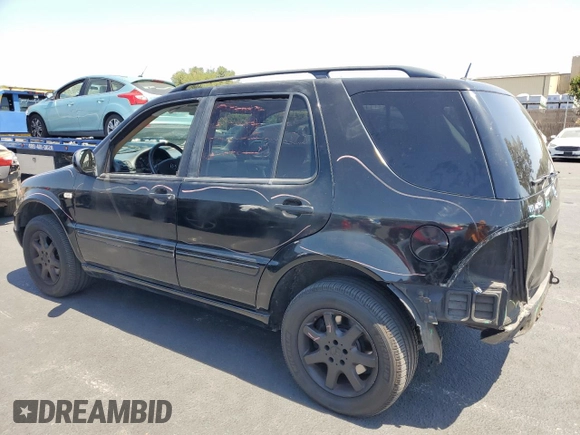 2000 Mercedes-Benz M 320/430/500 with VIN 4JGAB72EXYA193906, listed as a Copart auction lot 62025125 with 142,808 mi miles and Salvage title. Bid and sale history available at DreamBid. Image 2.