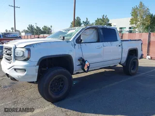 2016 GMC Sierra 1500 SLT with VIN 3GTU2NEC2GG244329, listed as a IAAI auction lot 40810002 with 121,716 mi miles. Bid and sale history available at carsss.com. Image 18.