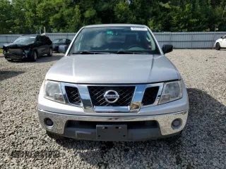 2010 Nissan Frontier LE with VIN 1N6AD0EV3AC414187, listed as a Copart auction lot 65335065 with 185,773 mi miles and Clean title. Bid and sale history available at DreamBid. Image 5.