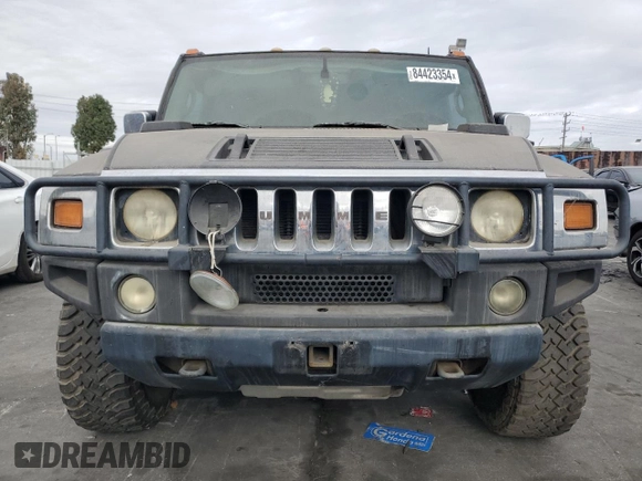 2003 Hummer H2 with VIN 5GRGN23UX3H101416, listed as a Copart auction lot 84423354 with 113,699 mi miles and Clean Title. Bid and sale history available at carsss.com. Image 5.